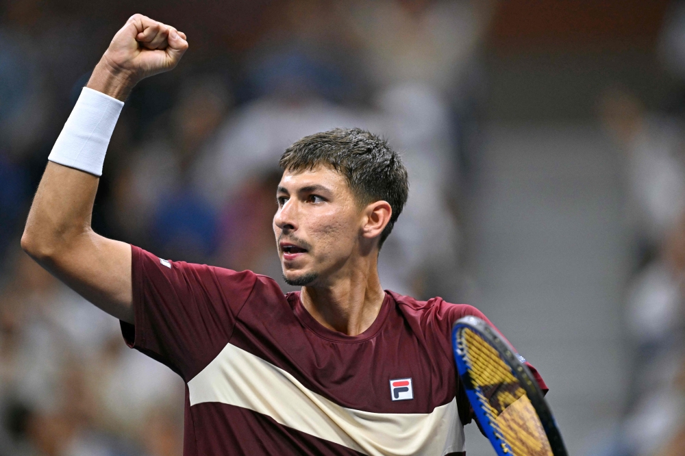  Australia's Alexei Popyrin celebrates after winning a game against Serbia's Novak Djokovic during their men's singles third round match on day five of the US Open tennis tournament at the USTA Billie Jean King National Tennis Center in New York City August 30, 2024. — AFP pic