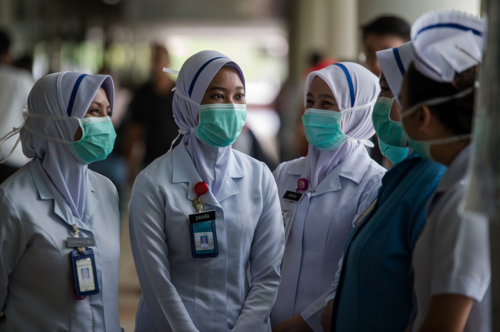 An undated file photograph shows healthcare workers at a hospital in Kuala Lumpur. — Bernama pic