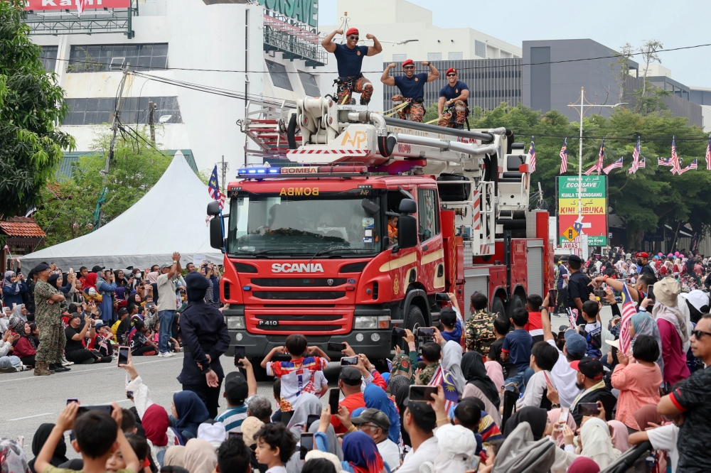 'Abang Bomba' were also a hit during the Terengganu Merdeka parade. — Bernama pic