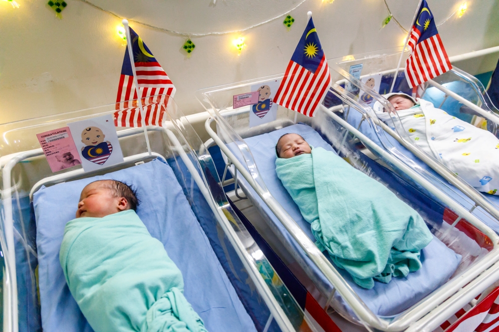 Jalur Gemilang are placed near babies born on Merdeka Day at Hospital Putrajaja, on August 31, 2024. — Picture by Firdaus Latif