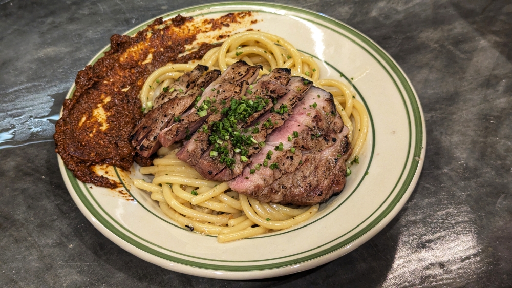 Pork collar with 'bucatini' was one of the best pasta dishes we tried. — Picture by Ethan Lau