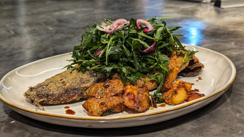 My favourite dish of the night: cornmeal-coated fried whole catfish. And those potatoes! Oh! — Picture by Ethan Lau