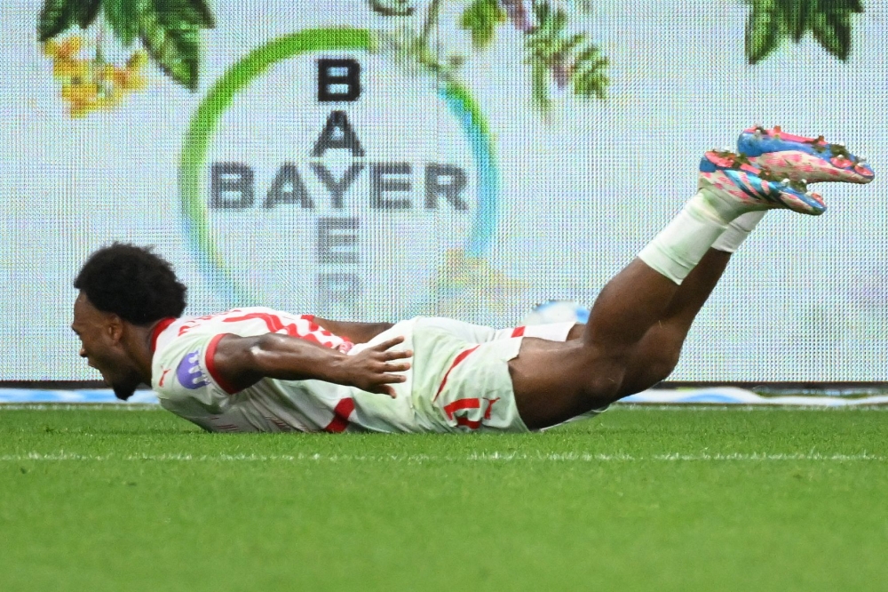 Lois Openda celebrates scoring the 2-3 goal during the German first division Bundesliga football match between Bayer 04 Leverkusen and RB Leipzig in Leverkusen, southwestern Germany on August 31, 2024. — AFP pic