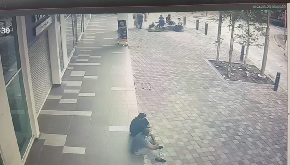 The moment Vijayaletchumy, a tourist from India, is seen plunging into the 8-metre deep sinkhole that formed near a bench in Masjid India on August 23, 2024. — Screen grab from CCTV footage provided by the Kuala Lumpur Fire and Rescue Department