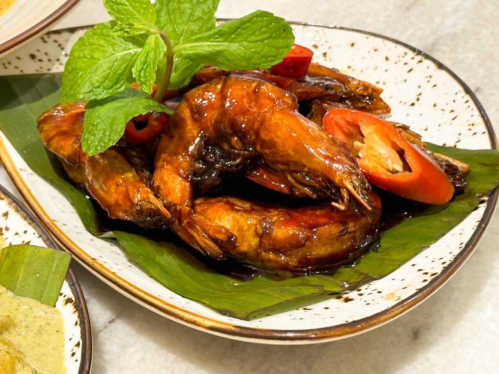 Tamarind Prawn has fresh prawns coated in a sticky sauce that is not too sour — Picture by Lee Khang Yi