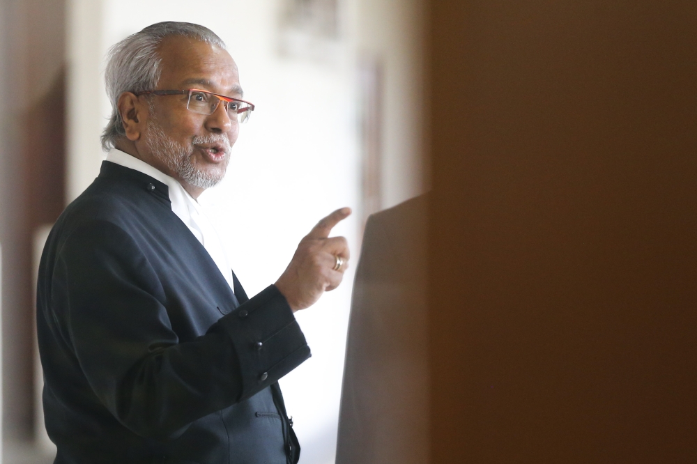 Tan Sri Muhammad Shafee Abdullah raised the Swiss court’s August 28 conviction of Tarek Obaid and Patrick Mahony during the 1MDB trial today.  — Picture by Miera Zulyana