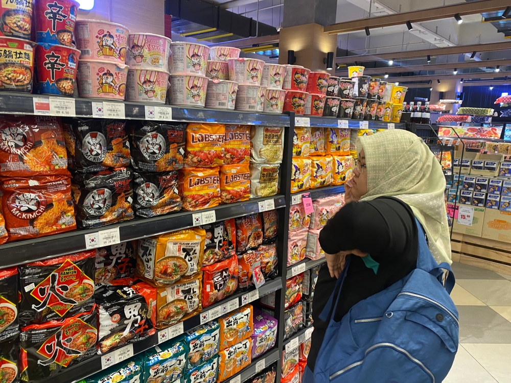 The popularity of Korea and its cuisine has caused supermarkets in town to stock up on Korean products. — Picture by Julia Chan