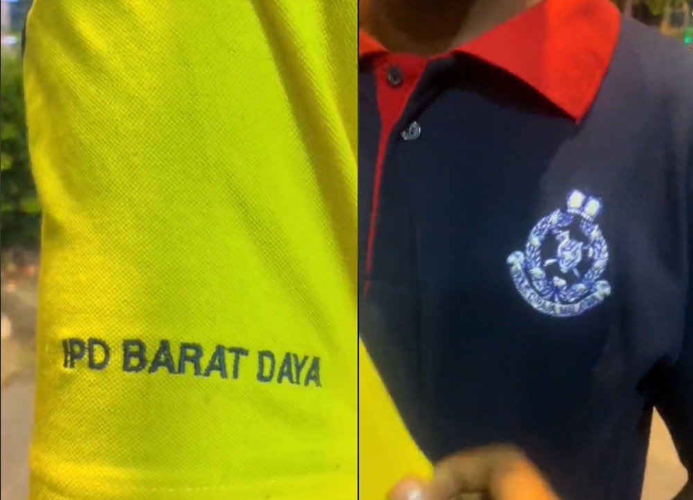 Police have clarified that a T-shirt bearing the logo of the Royal Malaysia Police and the name of the Barat Daya District Police Headquarters (IPD), worn by a foreign man, is not meant for official duties. — Picture via TikTok/muhammad.firdaus025