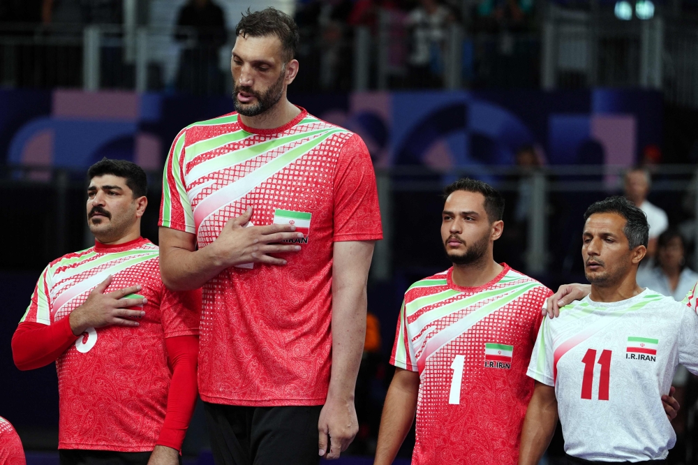 Morteza Mehrzad was planning to sleep on the floor of the Olympic Village because — unlike during the last Games in Tokyo — his bed wasn’t big enough. — AFP pic