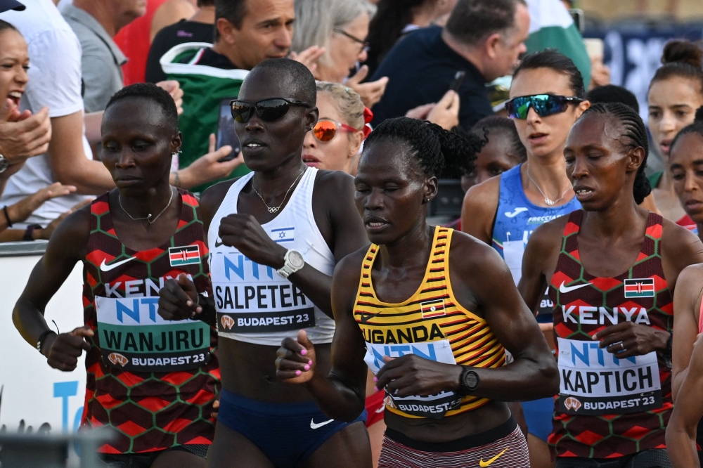 Uganda’s Rebecca Cheptegei (second from right) competes in the women’s marathon final during the World Athletics Championships in Budapest on August 26, 2023. — AFP pic