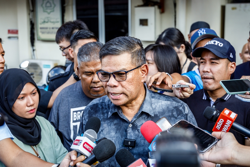 A file photograph shows Home Minister Datuk Seri Saifuddin Nasution Ismail speaking to reporters in Kuala Lumpur on July 18, 2024. — Picture by Firdaus Latif 