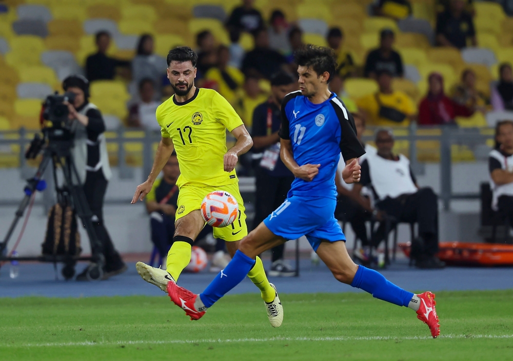 Malaysian player Paulo Josue (left) is challenged by Filipino player Jesper Gunnar Nyholm (right) during the semi-final match between Malaysia and the Philippines of the 2024 Merdeka Tournament Bukit Jalil National Stadium in Kuala Lumpur September 4, 2024. — Bernama pic