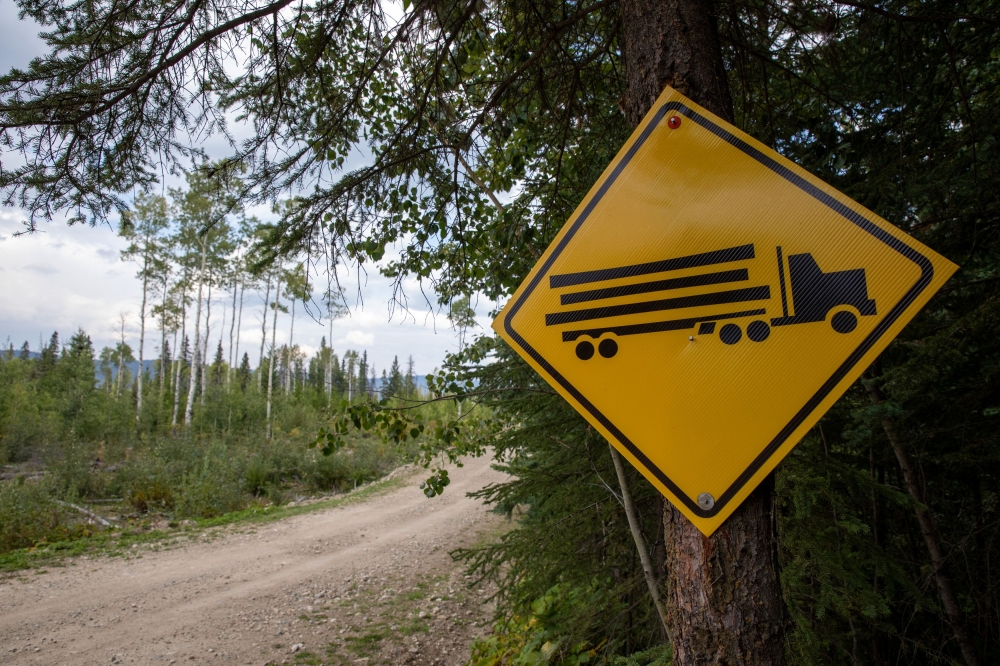 A sign warning motorists of the presence of logging trucks is seen east of Young Lake, British Columbia, Canada, September 5, 2023.  — Reuters pic