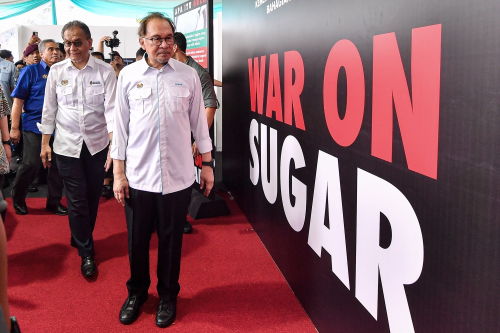 Prime Minister Datuk Seri Anwar Ibrahim, accompanied by Health Minister Datuk Seri Dzulkefly Ahmad, visits the Ministry of Health’s exhibition booth during the launch of the 2024 National Wellness Month in Port Dickson September 8, 2024. — Bernama pic