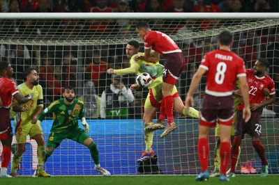 Torres seals ten-man Spain’s 4-1 win against Switzerland as pitch plagued by fungus, patches painted green