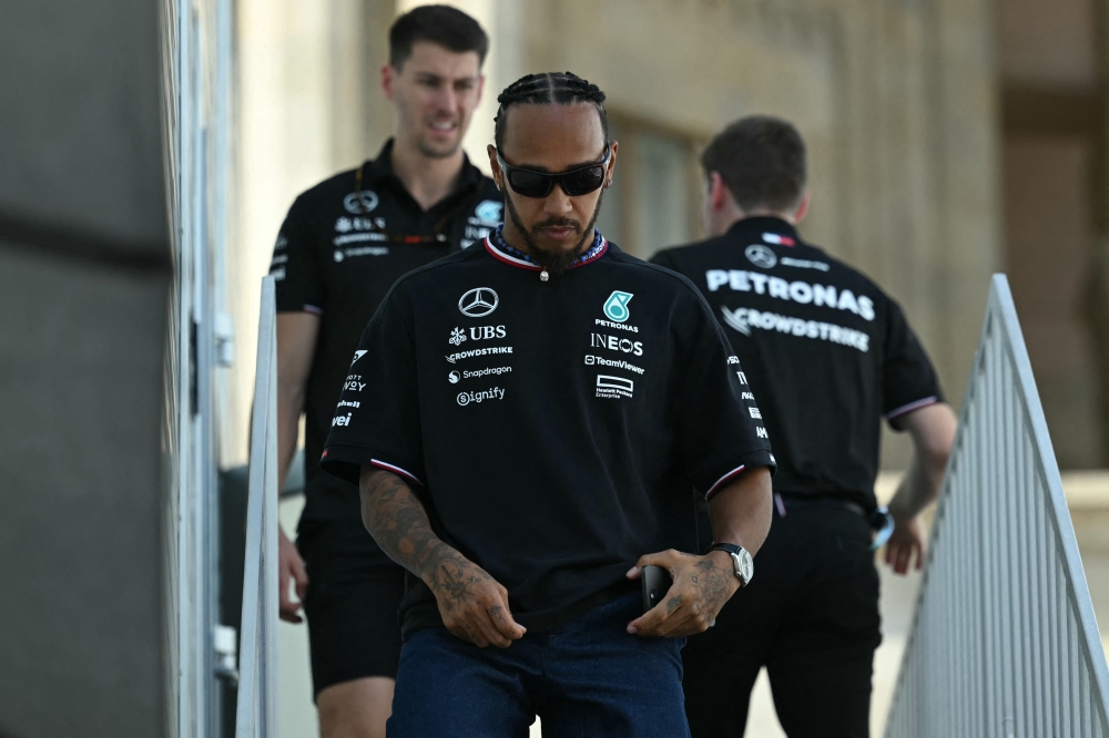 Mercedes' British driver Lewis Hamilton walks down the paddock ahead of the Formula One Azerbaijan Grand Prix in Baku on September 12, 2024. — AFP pic