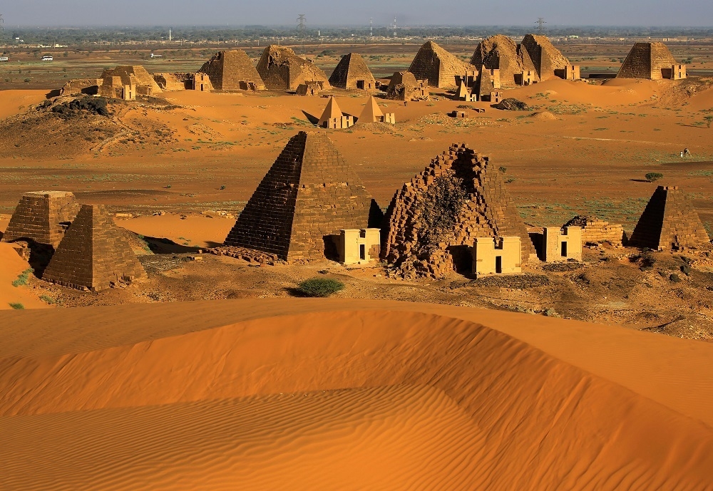 Creeping desert sands surround the Royal Cemeteries of Meroe Pyramids in Begrawiya at River Nile State, Sudan. — Reuters pic