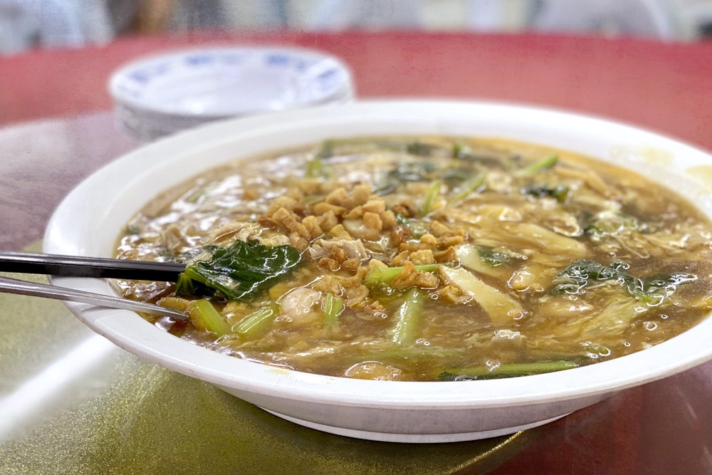  Fill your bellies with a big plate of 'wat dan hor' (rice noodles in egg gravy) — Picture by CK Lim