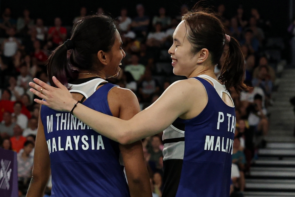 The third seed duo survived a gruelling 74-minute rubber set battle against Baek Ha Na-Lee So Hee before prevailing 22-20, 17-21, 21-15. — Bernama pic