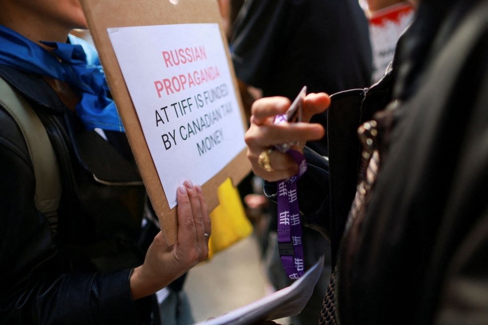 Protesters outside the Toronto International Film Festival (TIFF) screening of ‘Russians at War’ on September 10, 2024. REUTERS/Carlos Osorio/File Photo