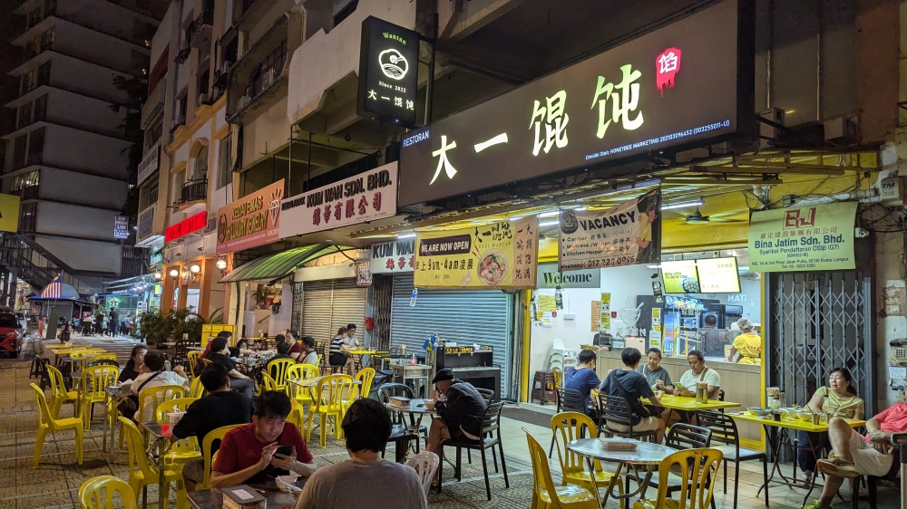 Most diners will sit outside the front of the shop, especially at night. — Picture by Ethan Lau