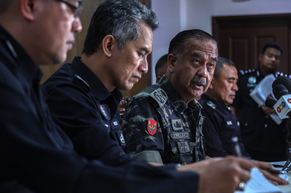 Inspector-General of Police Tan Sri Razarudin Husain conducts a press conference at the Malaysian Police Training Centre (Pulapol) in Kuala Lumpur September 13, 2024. — Bernama pic