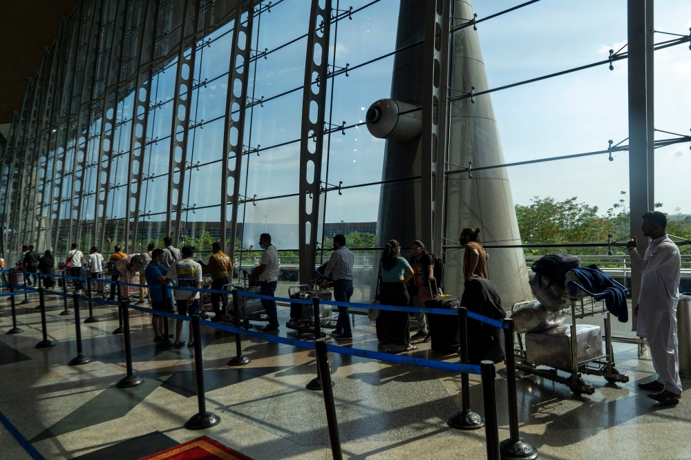 File picture of travellers at the Kuala Lumpur International Airport in Sepang, February 19, 2023. — Picture by Shafwan Zaidon