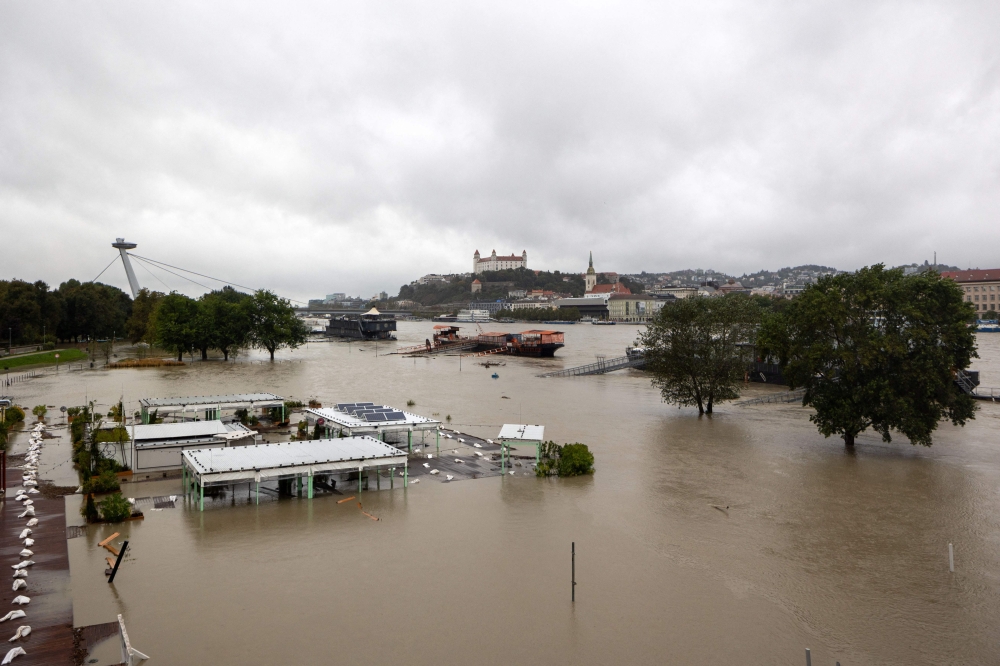 The banks of River Danube overflows as water levels continue to rise in Bratislava, Slovakia, on September 16, 2024. — AFP pic