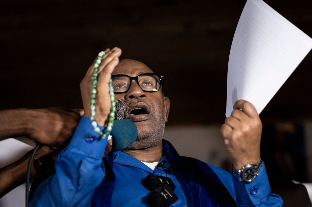 Former coup leader Azali Assoumani addresses supporters at his party's Convention for the Renewal of Comoros (CRC) headquarters in Moroni on January 16, 2024 after he won re-election in the first round of an already disputed presidential vote in the Comoros, dismissing a low turnout and allegations of fraud. — AFP pic