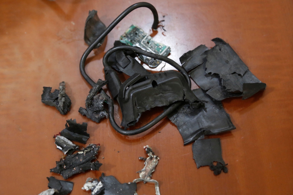 A photo taken on September 18, 2024, in Beirut's southern suburbs shows the remains of exploded pagers on display at an undisclosed location. — AFP pic