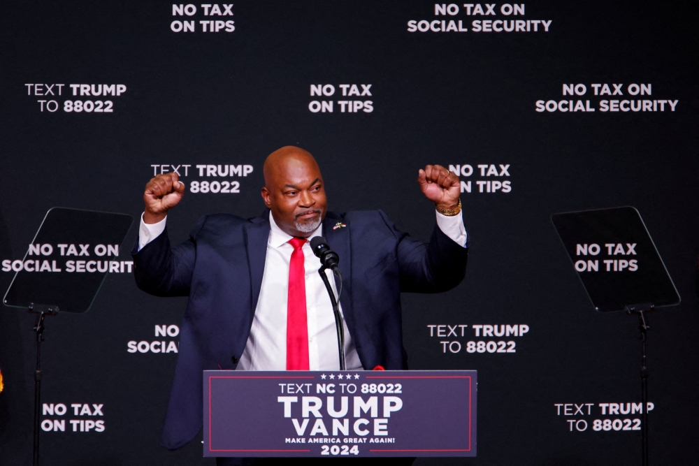 Republican candidate for North Carolina Governor and current North Carolina Lieutenant Governor, Mark Robinson gestures as he attends a campaign event in Asheville, North Carolina, U.S. August 14, 2024. — Reuters pic