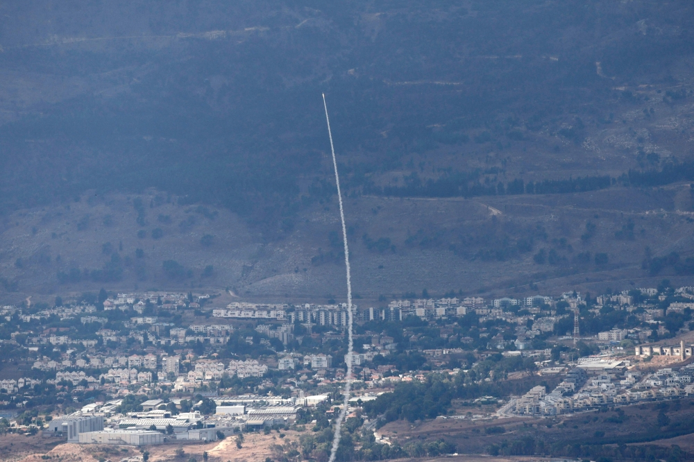 An rocket from Israel's Iron Dome air defence system is fired to intercept rockets fired from southern Lebanon over the Upper Galilee region in northern Israel on September 22, 2024. The United Nations special coordinator for Lebanon warned on September 22, of an ‘imminent catastrophe’ in the Middle East amid spiking violence between Israel and Lebanon's Hezbollah, saying a military solution was not the answer. — AFP pic