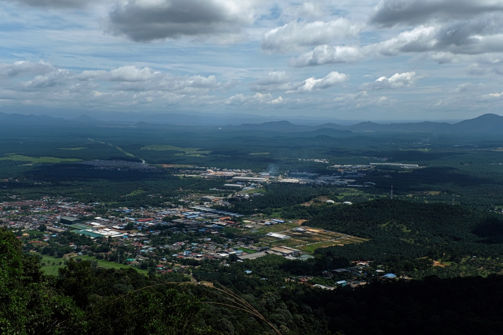 The reward for Gunung Lambak climbers who reach the top is this panoramic view of Kluang. — Bernama pic