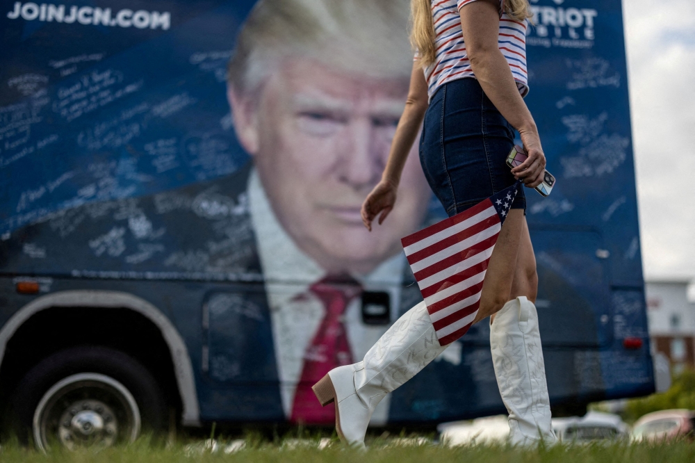 A supporter of Republican presidential nominee and former U.S. President Donald Trump arrives at a campaign rally in Indiana, Pennsylvania, U.S., September 23, 2024. — Reuters pic