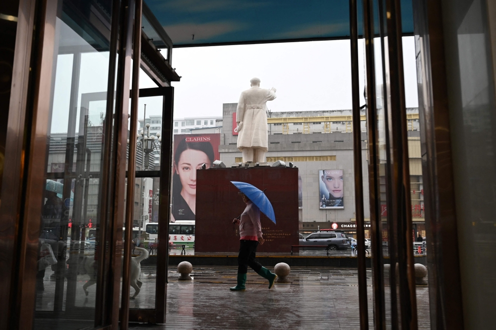 A statue of late communist leader Mao Zedong stands outside a shopping mall in Baotou September 8, 2024. — AFP pic