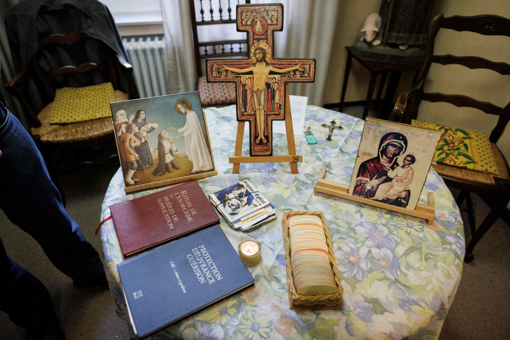 Religious icons and elements displayed in a room used by priests to conduct exorcism sessions at the Home Saint Joseph in Brussels September 11, 2024. — AFP pic