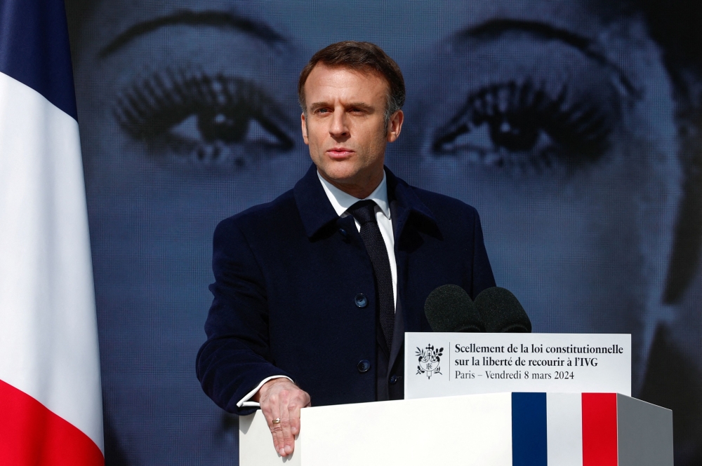 French President Emmanuel Macron delivers a speech during a ceremony to seal the right to abortion in the French constitution, on International Women's Day, at the Place Vendome, in Paris March 8, 2024. — AFP pic 