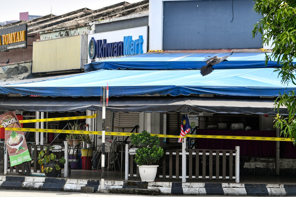 A file photo shows the sealed premises of a GISBH business in Seremban, on Sept 24, 2024. — Bernama pic