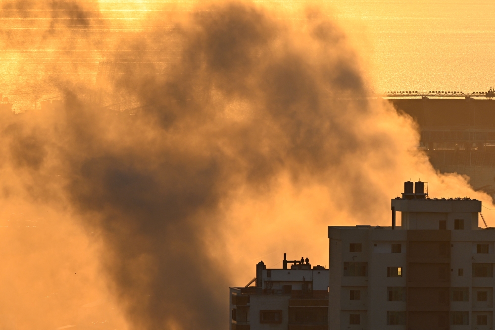 Smoke rises from the site of an Israeli airstrike on the Shiyah neighbourhood of Beirut’s southern suburbs on September 28, 2024. — AFP pic