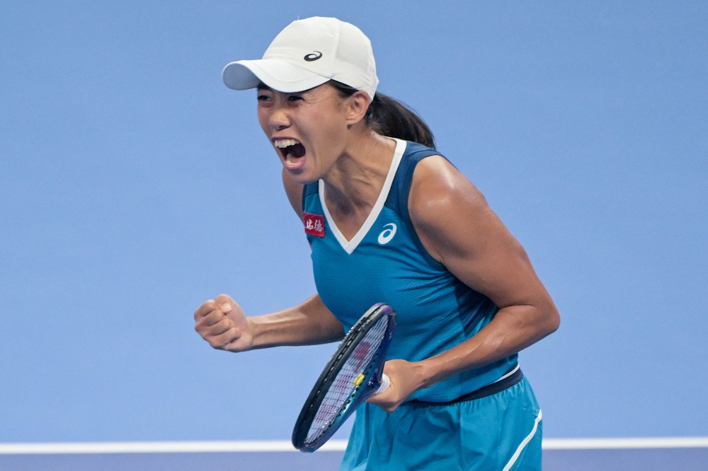 Zhang Shuai said she ‘feels like Rafael Nadal’ after the home player, ranked 595th powered into the last 16 to extend her historic China Open run on Sunday. — AFP pic