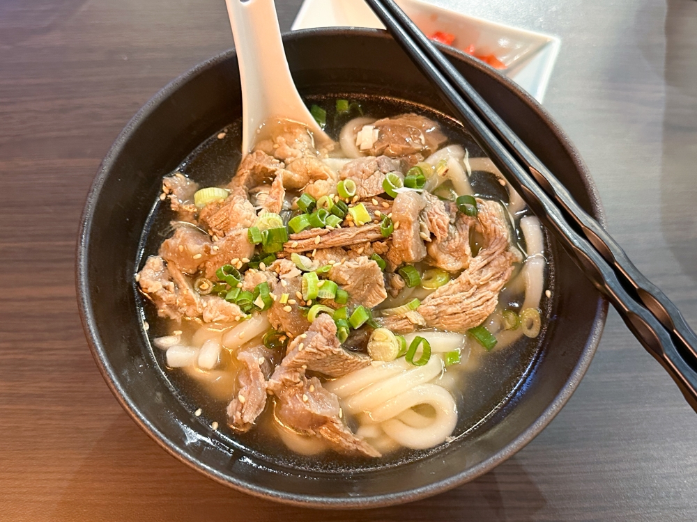 There are daily specials, like this comforting beef udon served with pickled ginger. — Picture by Lee Khang Yi