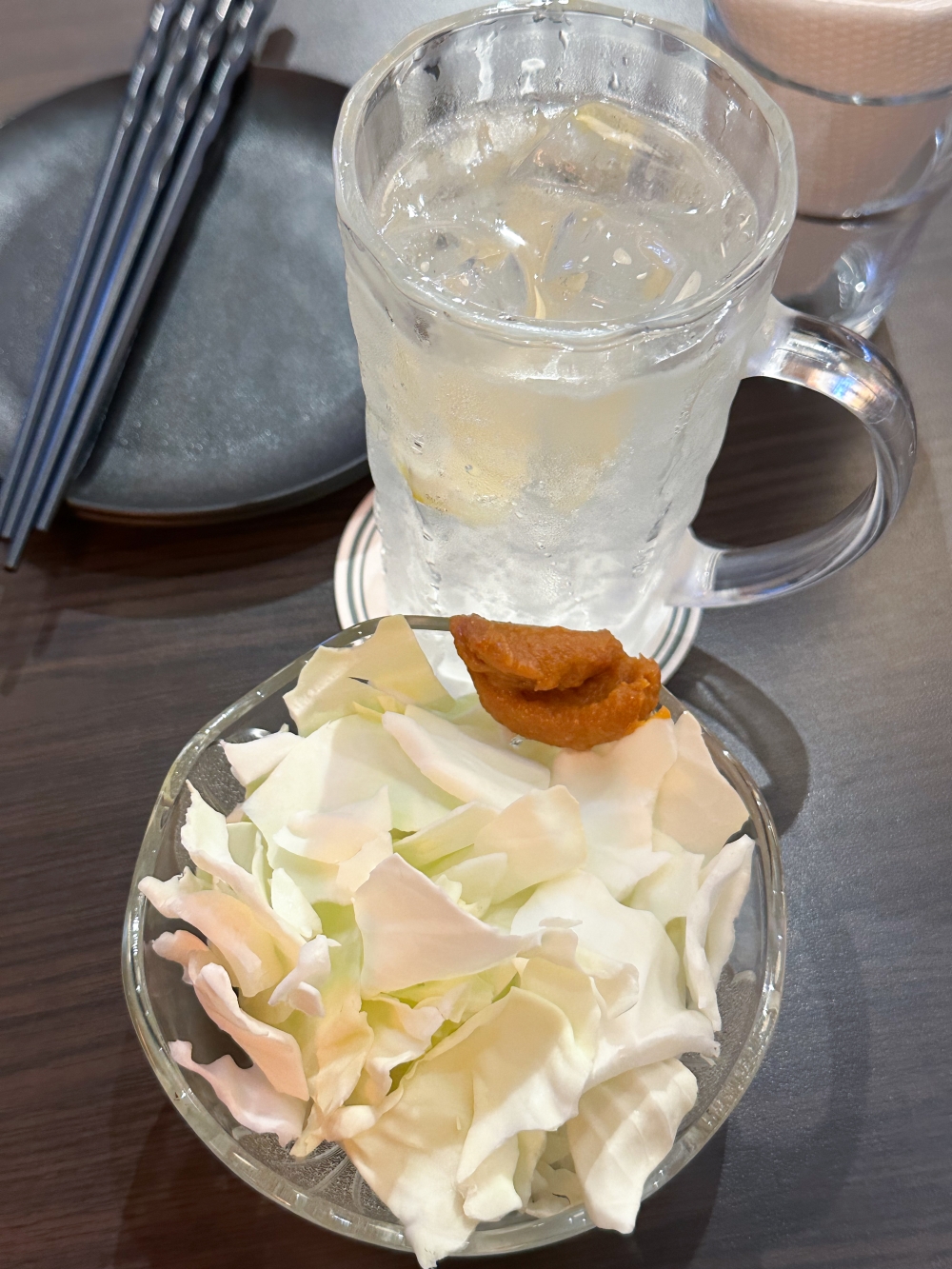 Your cabbage salad gets a savoury uplift with miso as you wait for your ‘yakitori’. — Picture by Lee Khang Yi