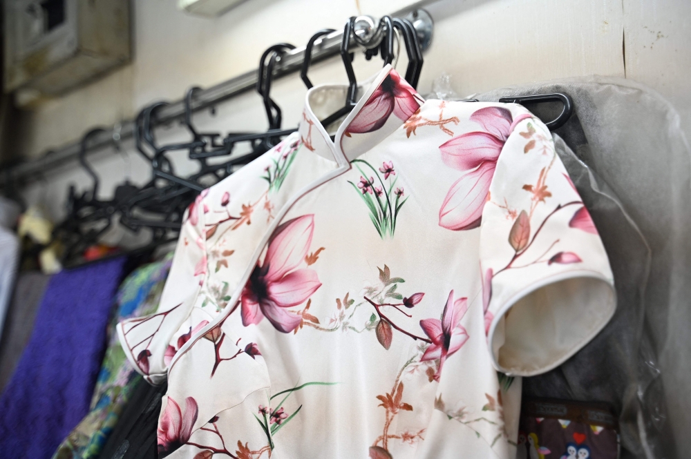 A cheongsam made by master tailor Yan Kar-man in his small workshop in Kowloon, Hong Kong September 5, 2024. — AFP pic