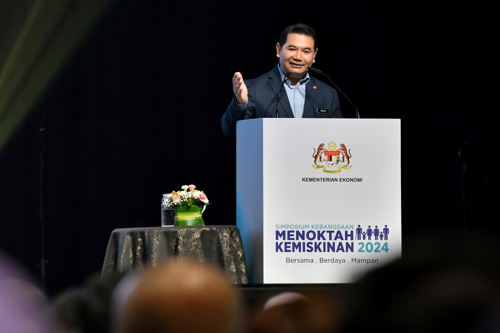 Economy Minister Rafizi Ramli said the government is committed to intensifying efforts to eradicate hardcore poverty in line with Malaysia’s healthy economic performance. — Bernama pic