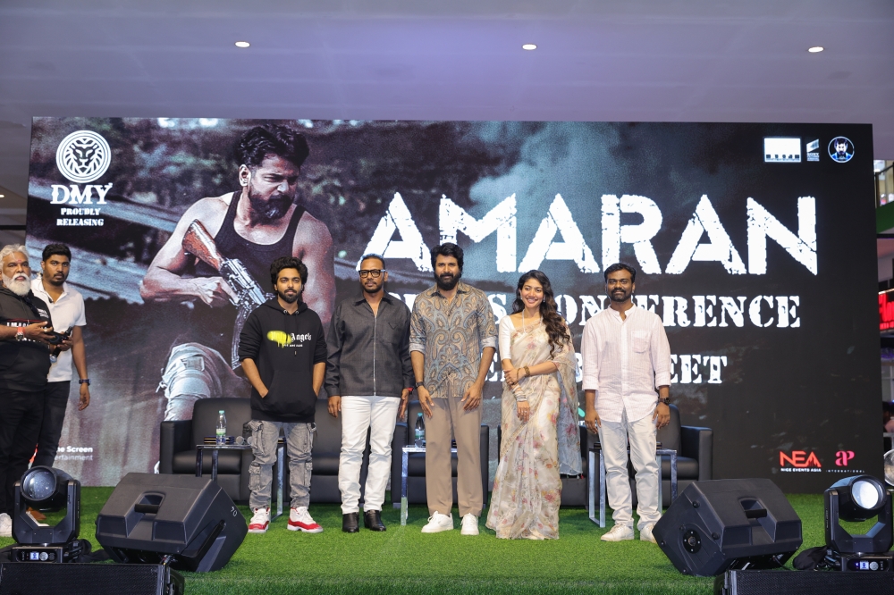 From Left: Music director GV Prakash, DMY Creation’s founder and chairman DatukMuhammad Yusoff, Sivakarthikeyan, Sai Pallavi and director Rajkumar Periyasamyposing for a photograph after they took turns to speak about biographical war action filmAmaran during its promotion yesterday at Anggun City, Rawang. — Picture by DMYCreation.