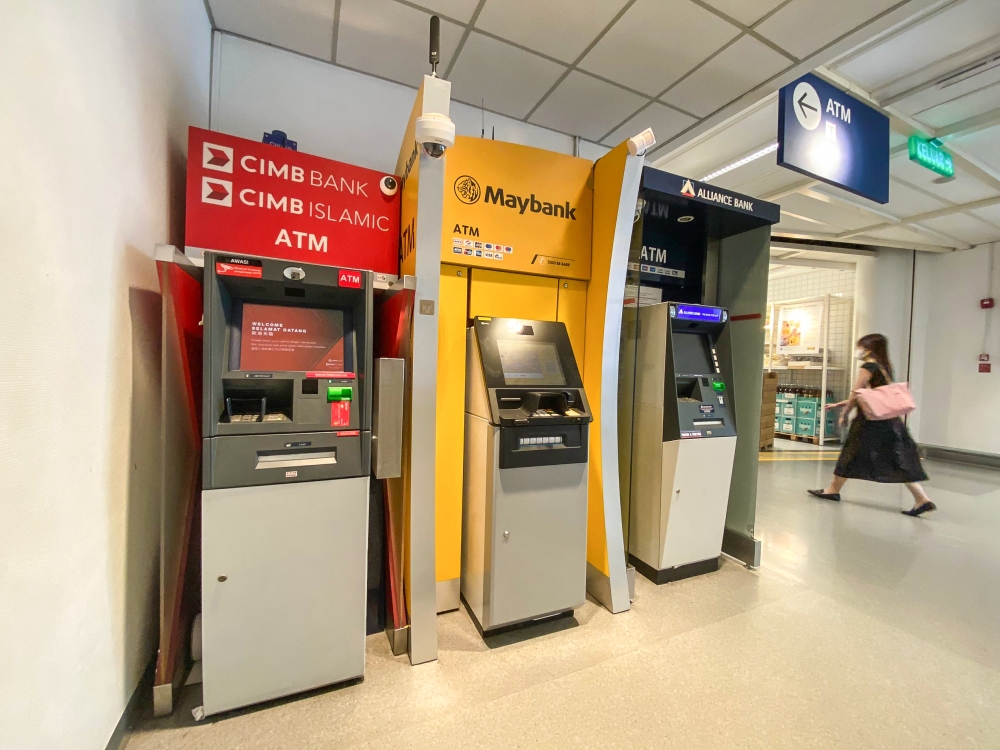 A row of automated teller machines (ATM) are seen at a shopping centre in Petaling Jaya on October 1, 2024. — Picture by Yusof Mat Isa