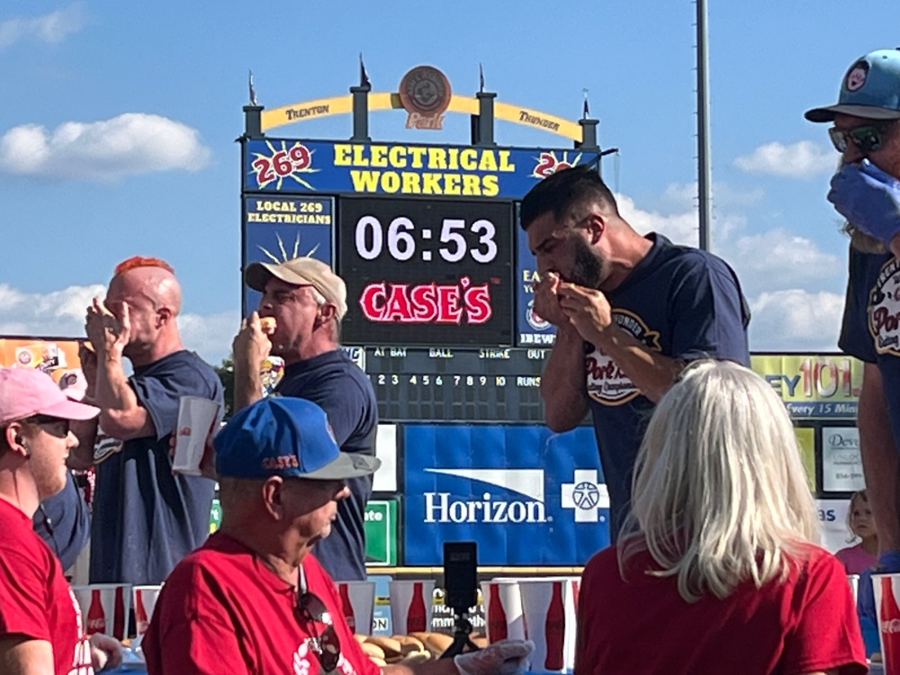 Competitors take part in a pork roll competitive eating contest in Trenton, New Jersey, on September 21, 2024. — AFP pic