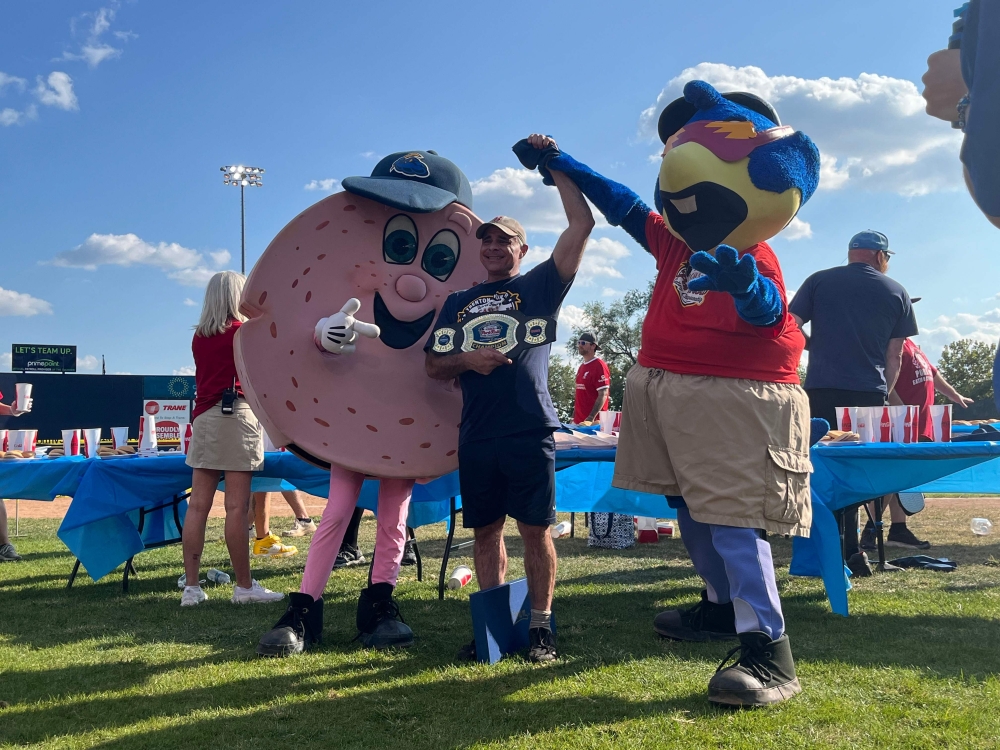 Geoffrey Esper celebrates winning a pork roll competitive eating contest in Trenton, New Jersey, on September 21, 2024. — AFP pic