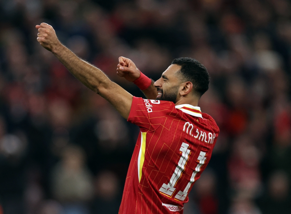 Liverpool’s Mohamed Salah celebrates scoring their second goal during their Uefa Champions League match against Bologna in Liverpool October 2, 2024. — Action Images pic via Reuters/Lee Smith