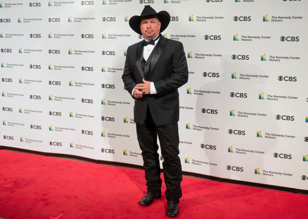 US country legend Garth Brooks accused of rape in new lawsuit by former hair and makeup artist